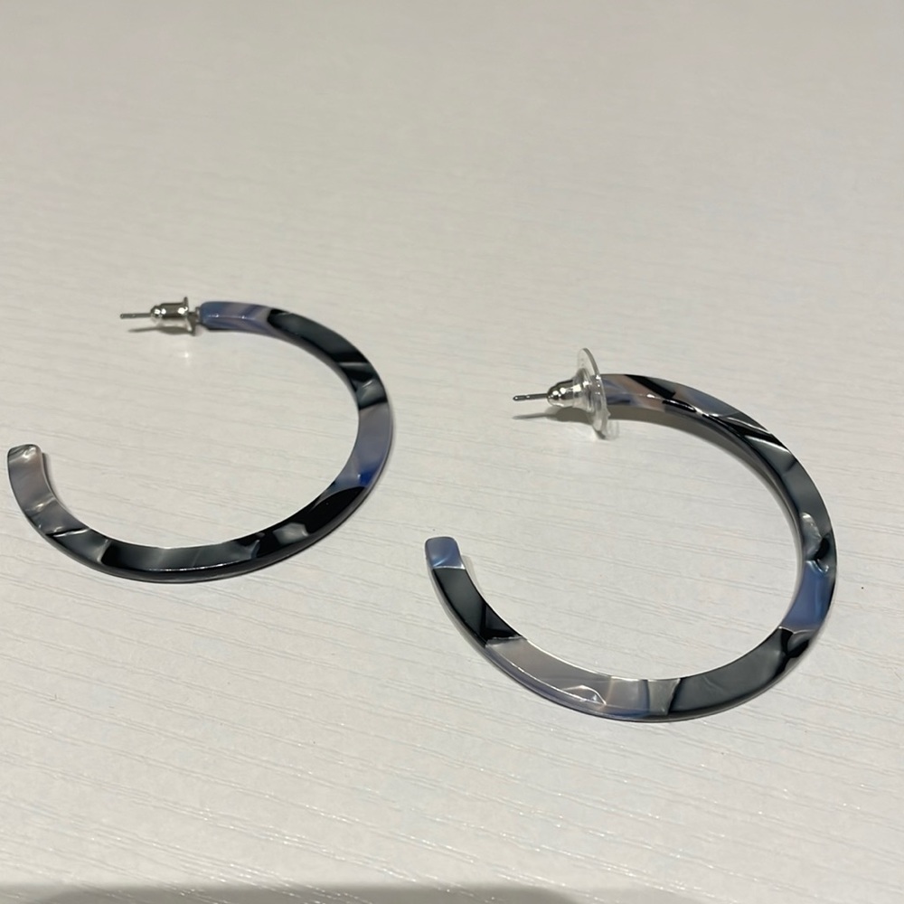 New earrings in blue, black, gray design. Hoop earrings never worn.